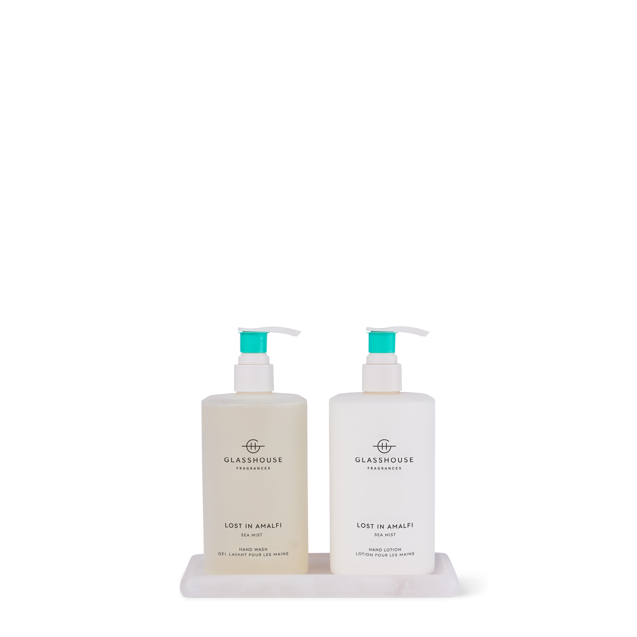 Glasshouse Fragrances Lost In Amalfi Hand Wash & Hand Lotion sitting on a Resin Tray.