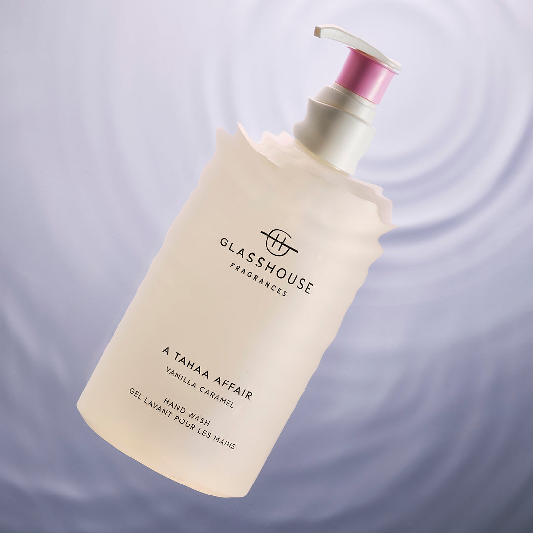 Glasshouse Fragrances A Tahaa Affair Hand Wash resting on water.