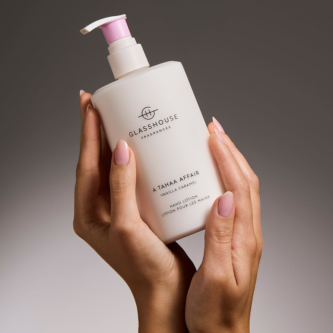 Glasshouse Fragrances A Tahaa Affair Hand Lotion close up in hands.