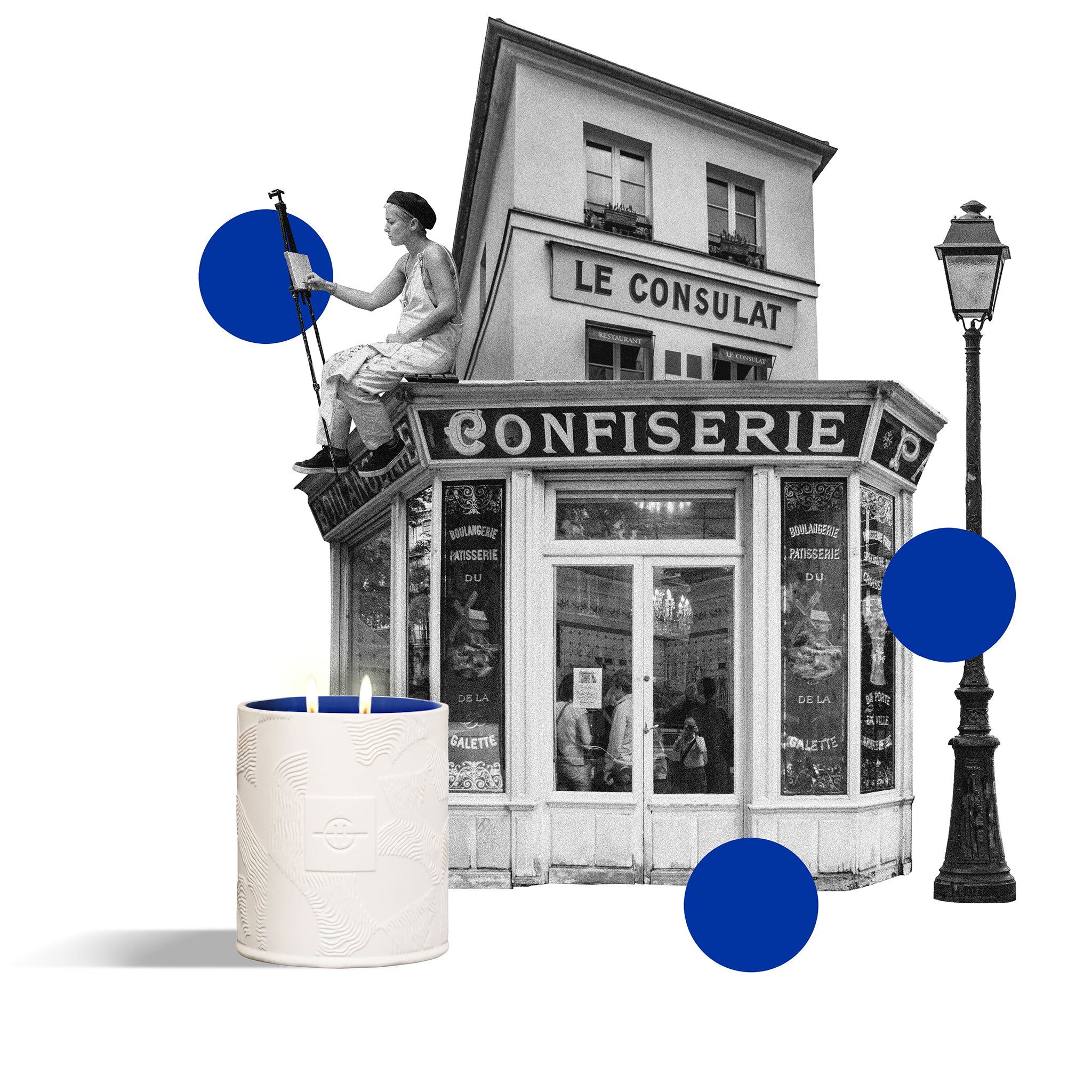 Glasshouse Fragrances Montmartre Macaron 380g Soy Candle burning over a black and white photo of building with french signage